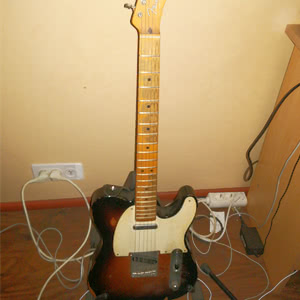 Fender Telecaster in my bedroom.